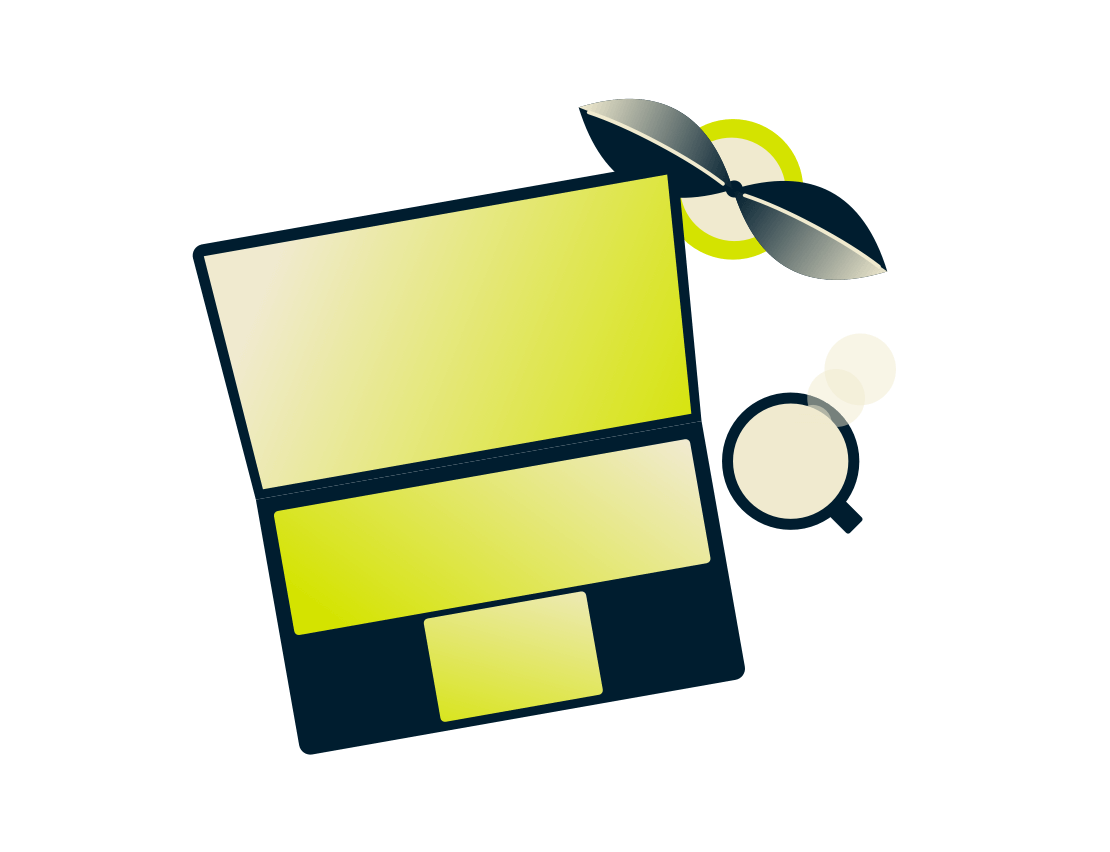 Ноутбук с растением и напитком.