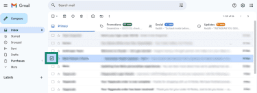 Gmail inbox with a suspicious email selected, showing checkbox enabled for message actions.