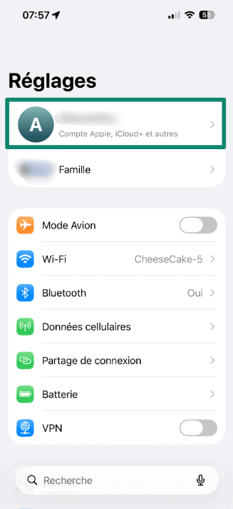 Screenshot showing Apple ID in the iPhone Settings menu