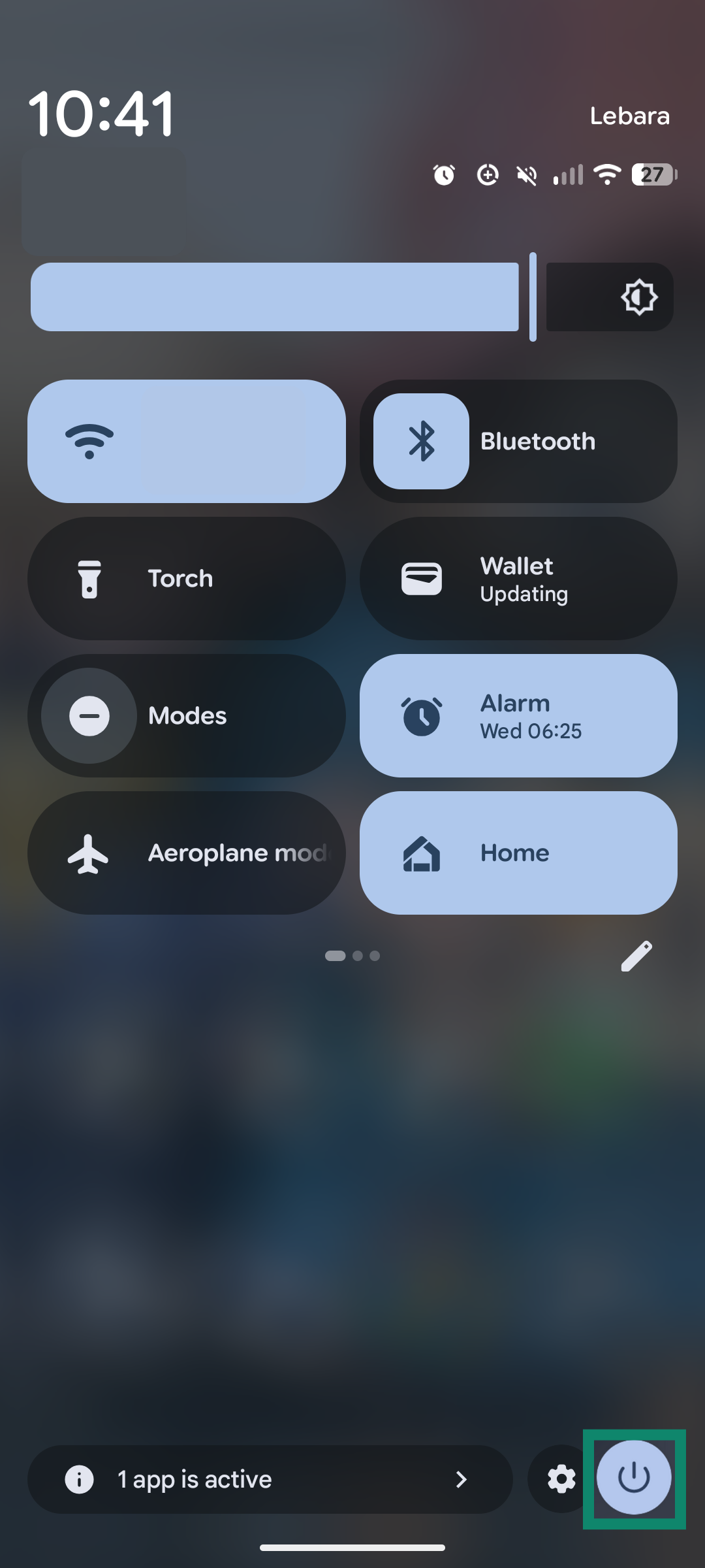 An Android Quick Settings panel with the power icon highlighted in the bottom-right corner.