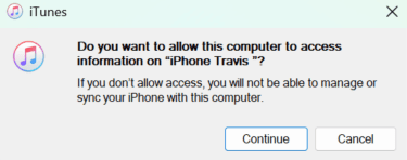 iTunes prompt requesting access to an iPhone.