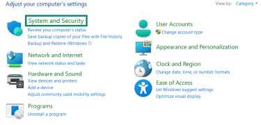 Windows control panel showing the System and Security setting highlighted.