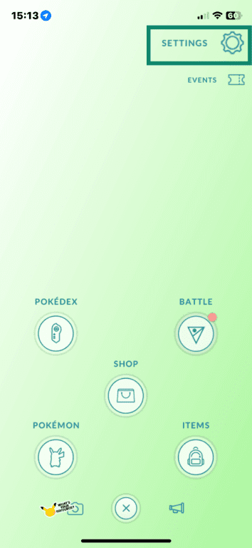 Pokémon GO on iOS highlighting settings option with cog icon