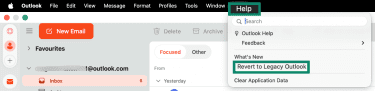 The "Revert to Legacy Outlook" button on new Outlook for Mac.